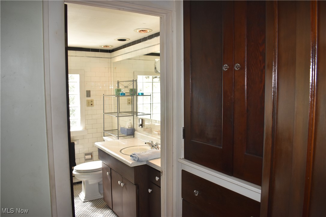 4581 Pearl Road Cleveland, OH 44109 - Photo 18 of 36 Bathroom with vanity and tile patterned floors