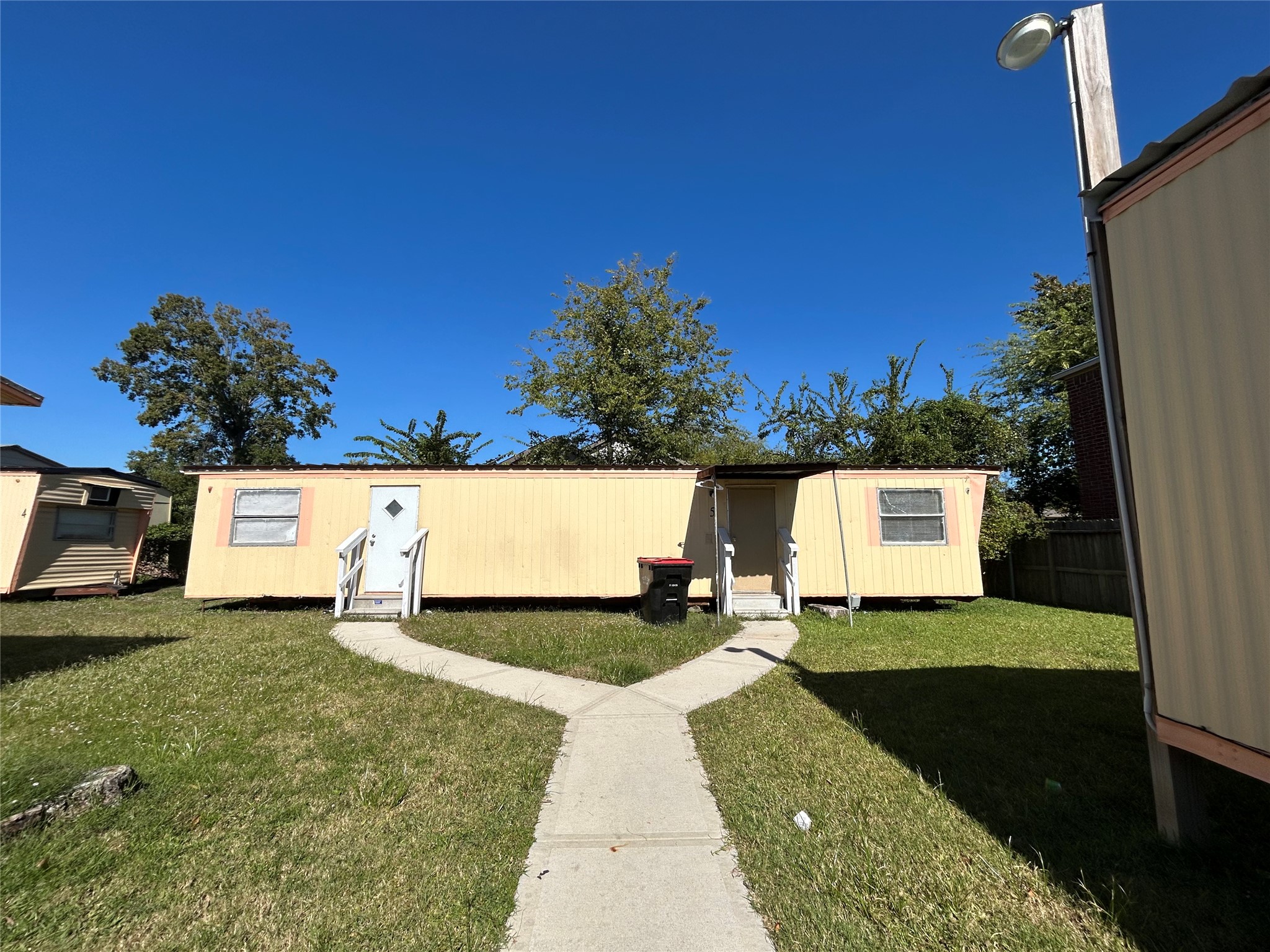 13927 Victoria Street, Unit 5 Houston, TX 77015 - Photo 6 of 6 a view of outdoor space with garden