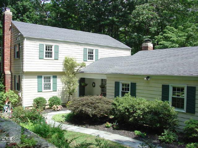 259 Mountain Road Wilton, CT 06897 - Photo 1 of 1 a view of a house with a yard and plants