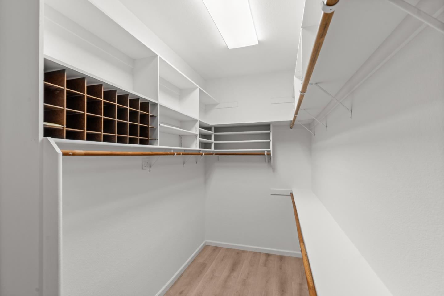 8750 McCarty Ranch Drive San Jose, CA 95135 - Photo 23 of 59 a view of walk in closet with empty racks
