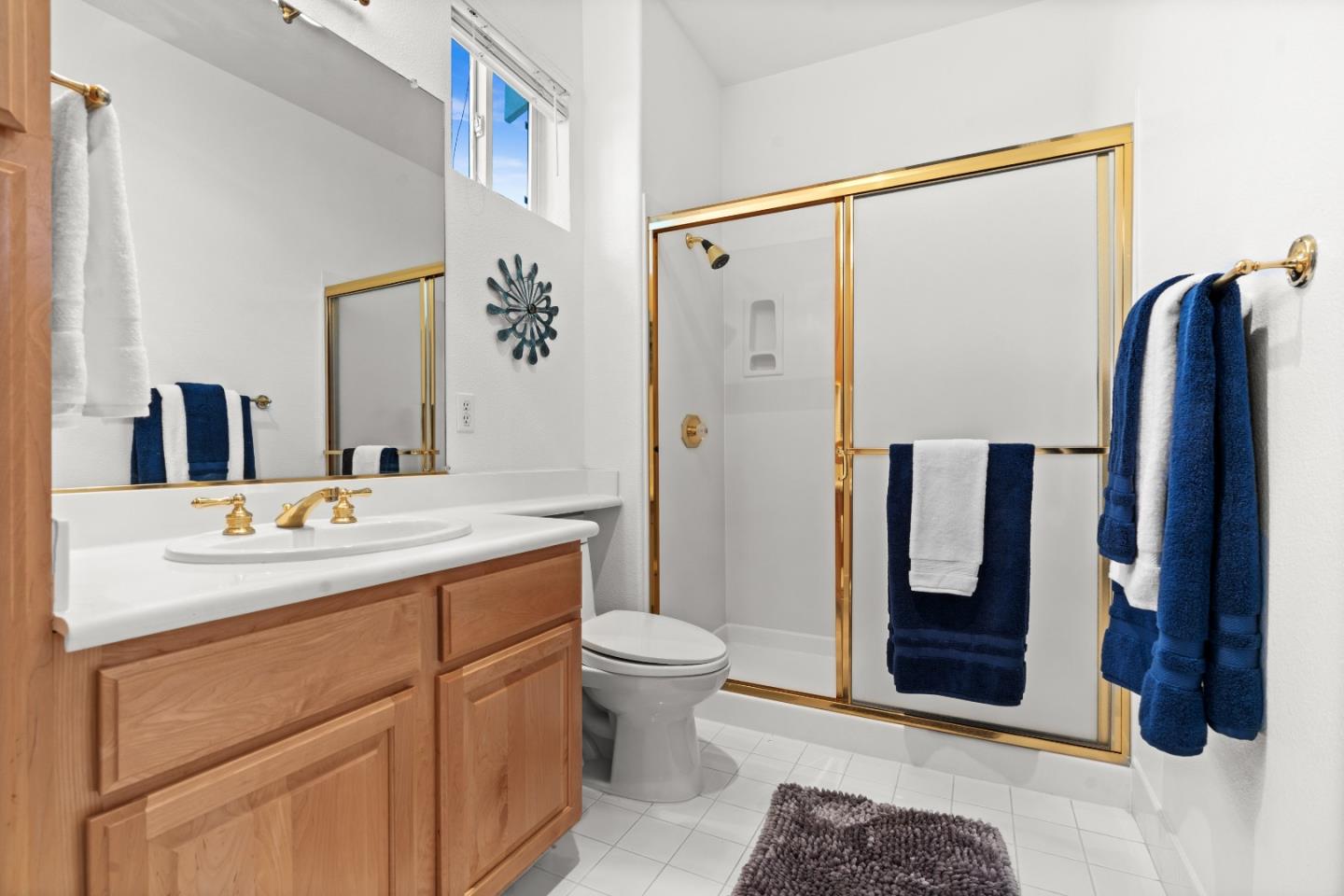 8750 McCarty Ranch Drive San Jose, CA 95135 - Photo 25 of 59 a bathroom with a sink and a mirror