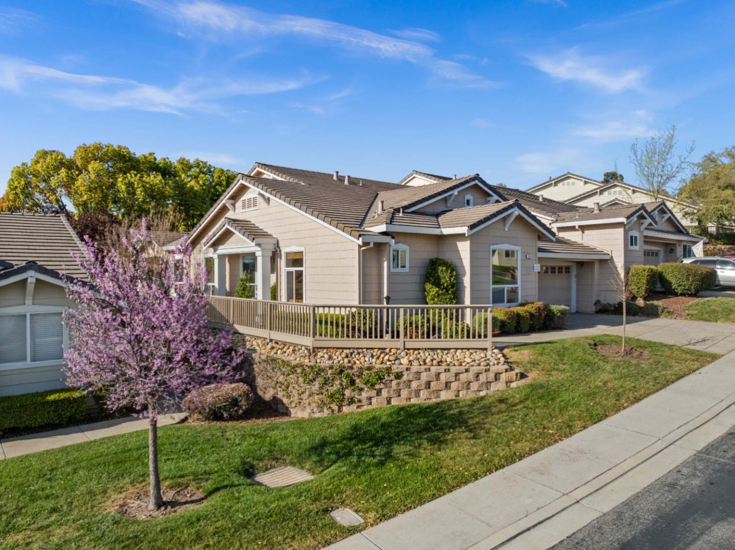 8750 McCarty Ranch Drive San Jose, CA 95135 - Photo 4 of 59 a front view of a house with a garden