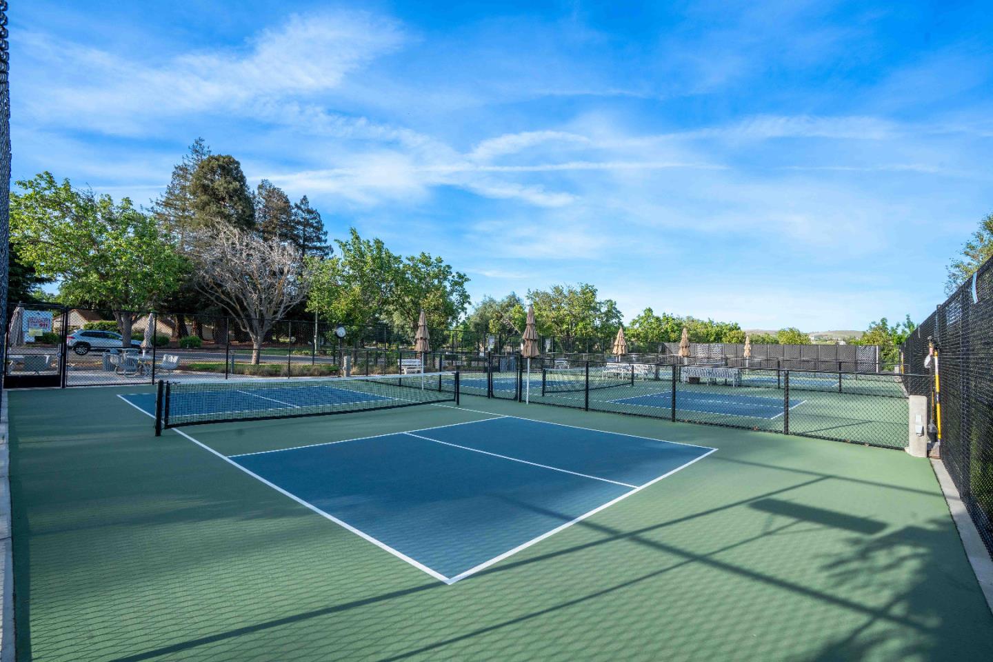 8750 McCarty Ranch Drive San Jose, CA 95135 - Photo 45 of 59 a view of an outdoor space and tennis court