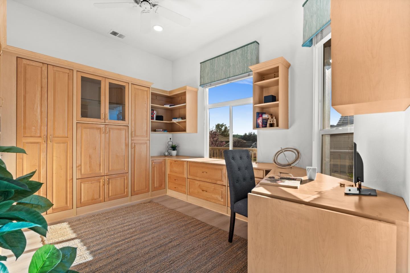 8750 McCarty Ranch Drive San Jose, CA 95135 - Photo 10 of 59 a room with cabinets and wooden floor