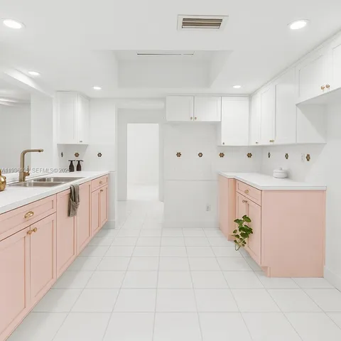 a kitchen with white cabinets