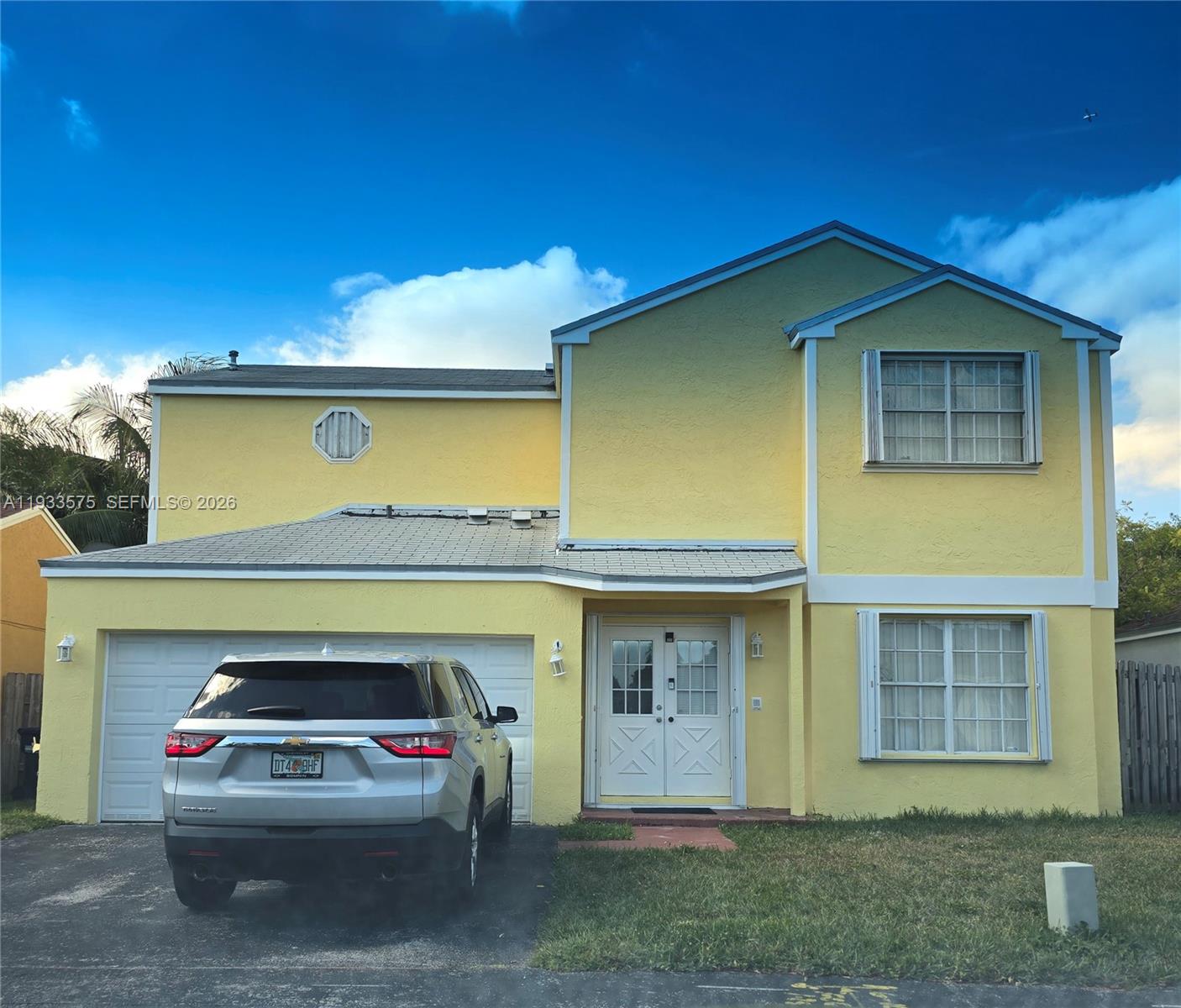 12687 Southwest 146th Street Miami, FL 33186 - Photo 1 of 20 a view of a car garage