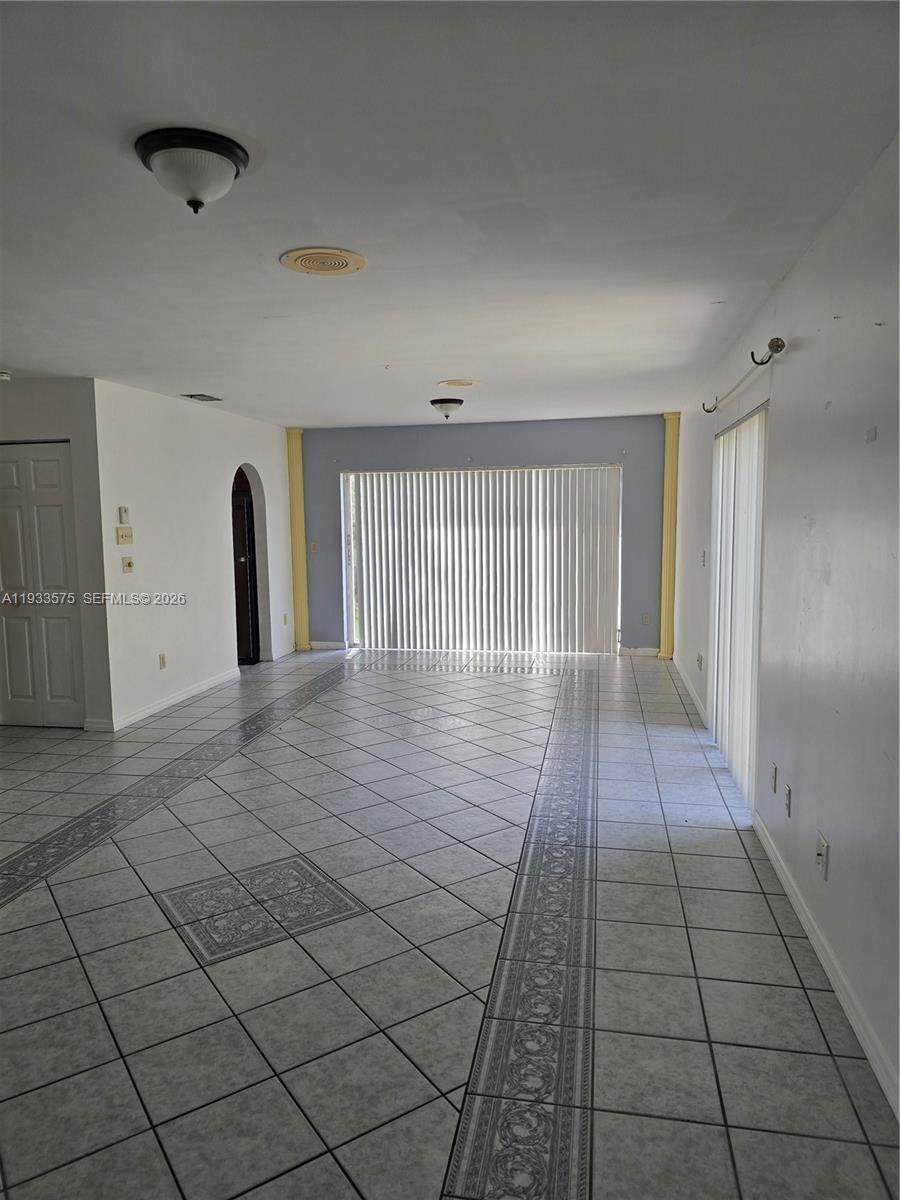 12687 Southwest 146th Street Miami, FL 33186 - Photo 14 of 20 a view of a hallway
