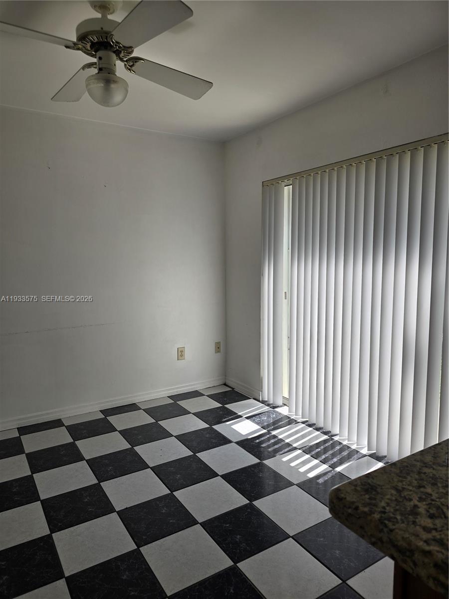 12687 Southwest 146th Street Miami, FL 33186 - Photo 15 of 20 a black and white checkered floor