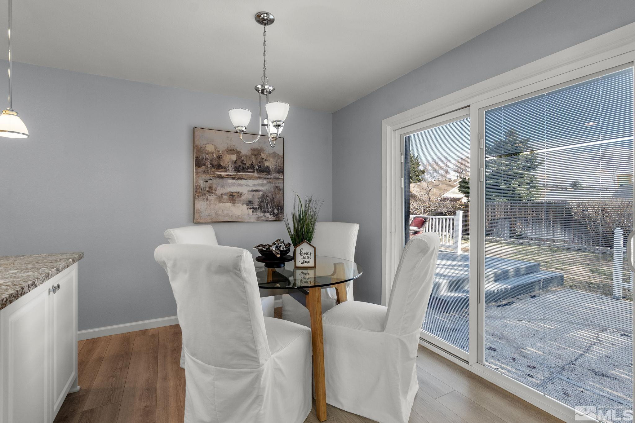 2332 Madera Court Reno, NV 89523 - Photo 20 of 36 a view of a dining room with furniture and wooden floor
