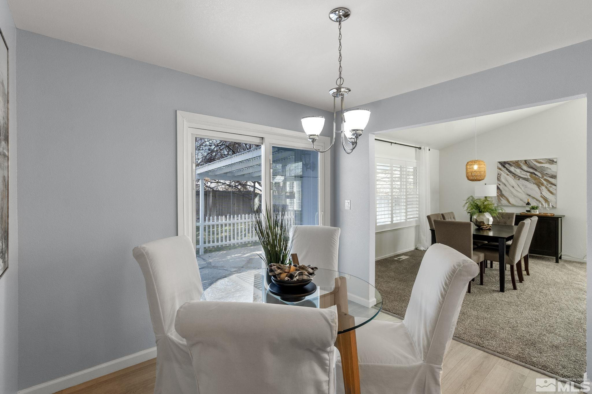 2332 Madera Court Reno, NV 89523 - Photo 21 of 36 a view of a dining room with furniture window and outside view