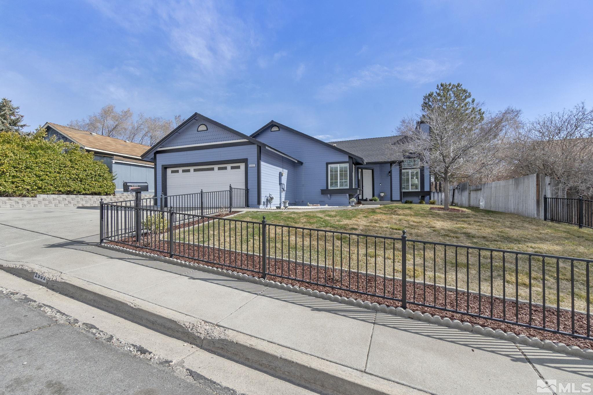 2332 Madera Court Reno, NV 89523 - Photo 3 of 36 a view of a houses with a small yard