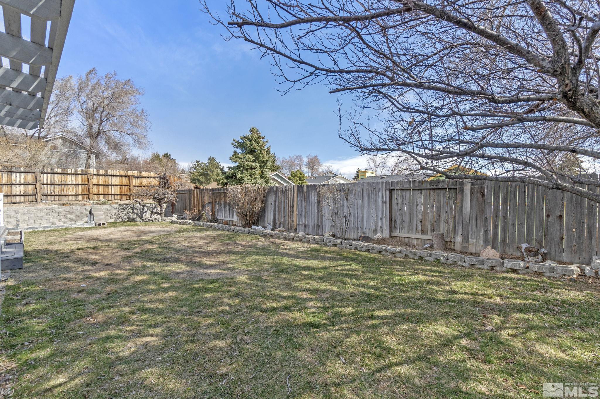 2332 Madera Court Reno, NV 89523 - Photo 35 of 36 a view of outdoor space with wooden fence