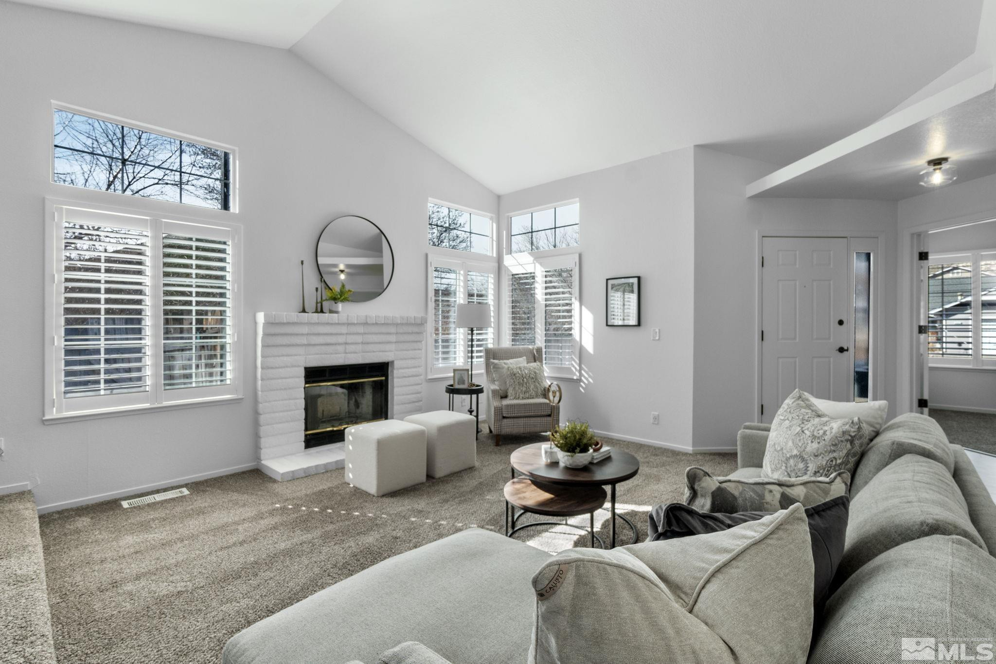 2332 Madera Court Reno, NV 89523 - Photo 5 of 36 a living room with furniture and a fireplace