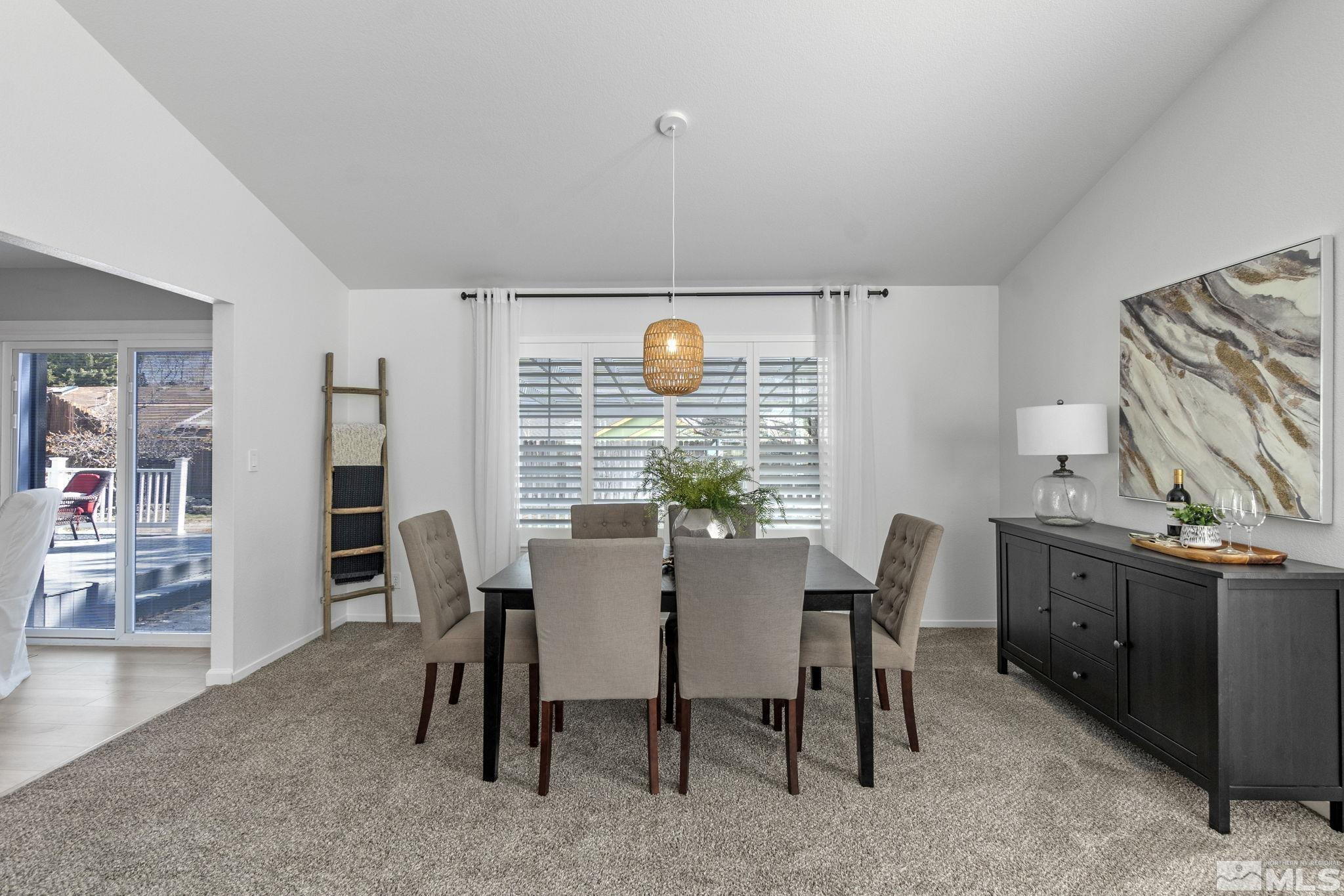 2332 Madera Court Reno, NV 89523 - Photo 9 of 36 a view of a dining room with furniture window and wooden floor