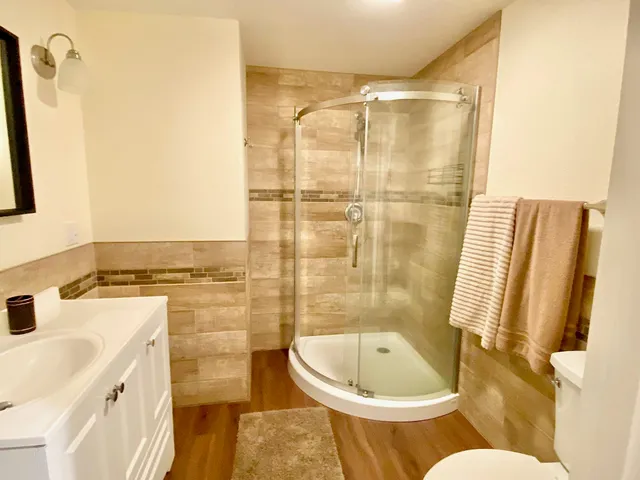 a bathroom with a sink and a shower