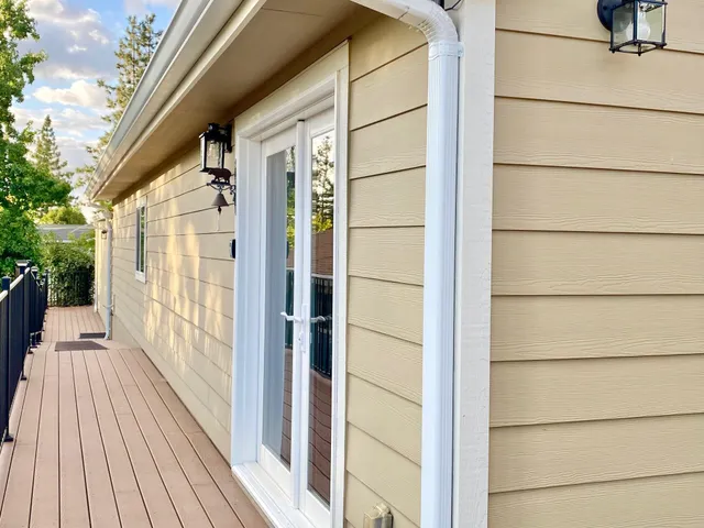 a view of a house with a large window