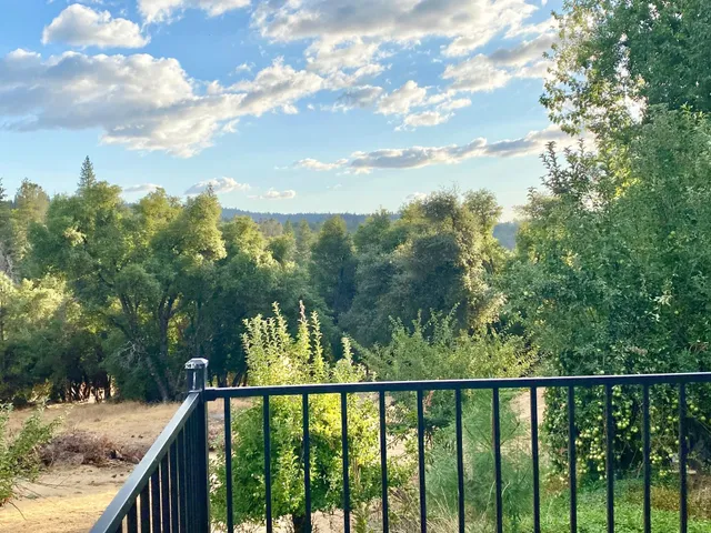 a view of a balcony with an outdoor space