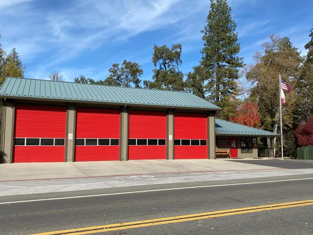 a view of outdoor space with signage and flags