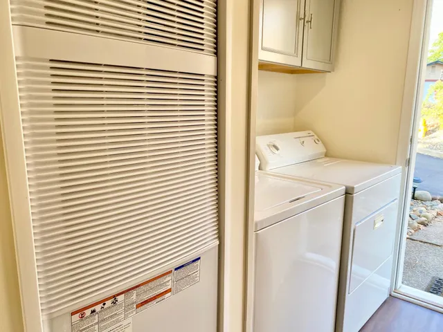 a utility room with a washer and dryer