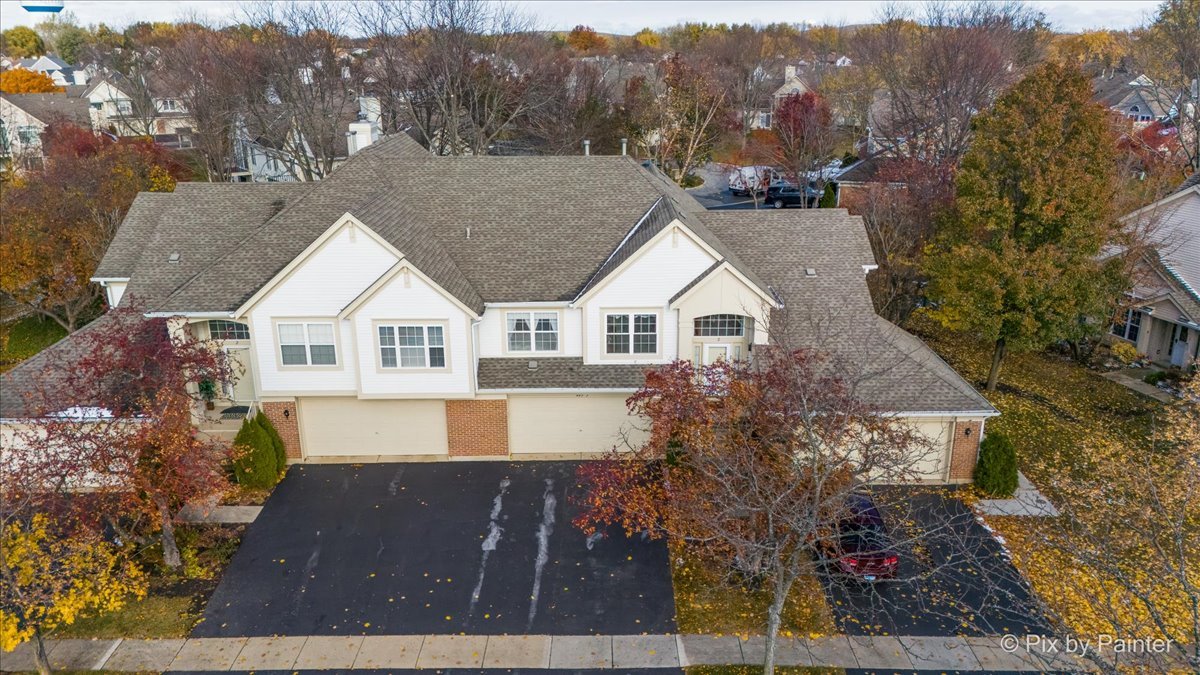 445 Cromwell Circle, Unit 3 Bartlett, IL 60103 - Photo 2 of 37 a view of house with garden