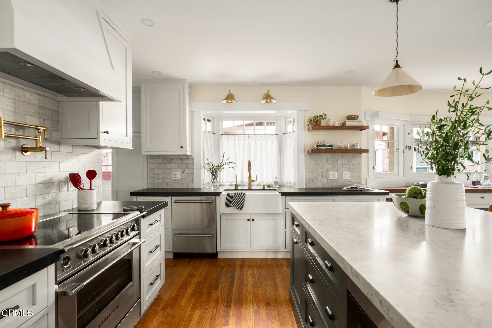 501 Douglas Street Pasadena, CA 91104 - Photo 14 of 36 a kitchen with a stove and a sink