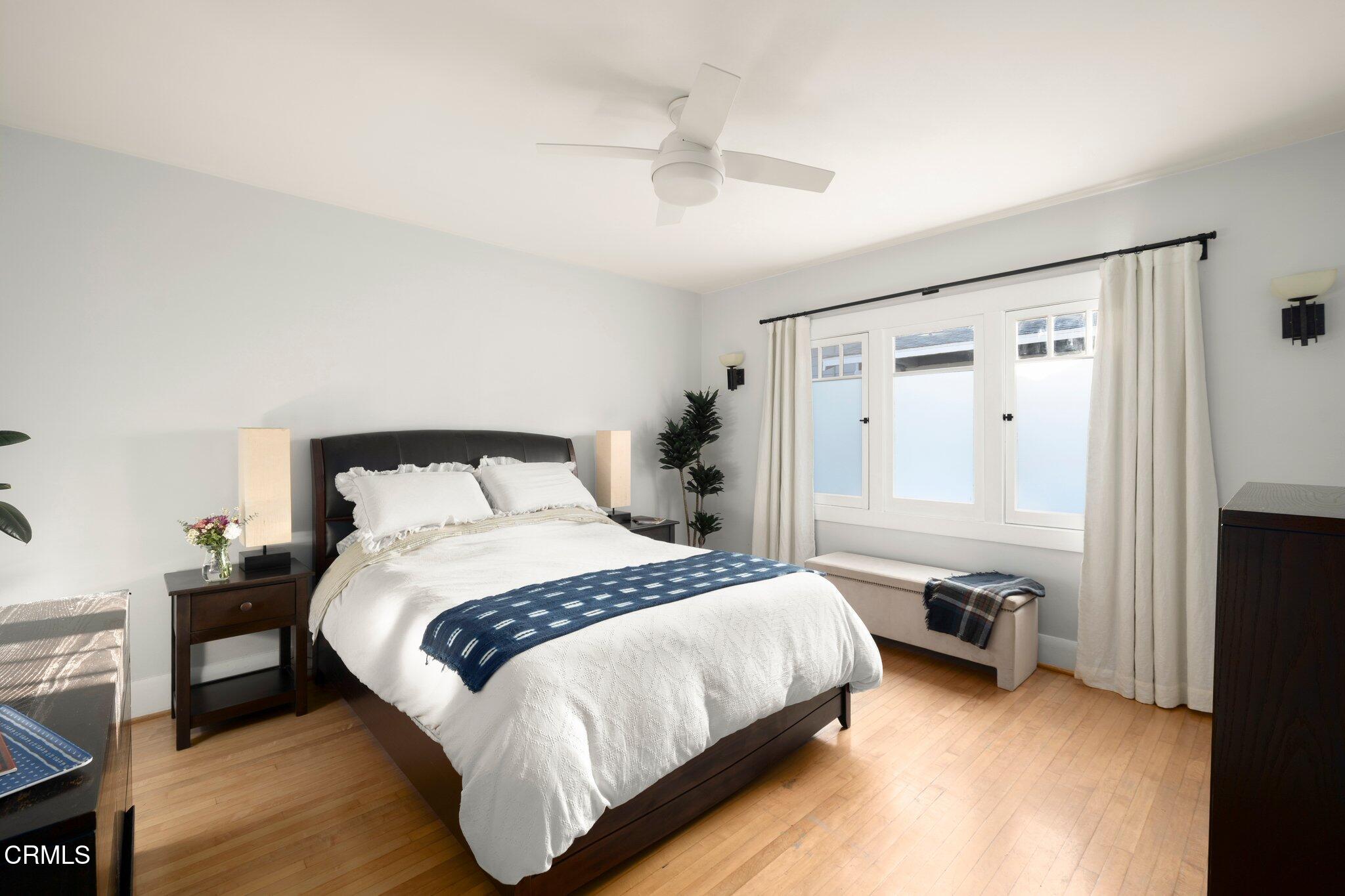 501 Douglas Street Pasadena, CA 91104 - Photo 17 of 36 a bedroom with a bed and a tv