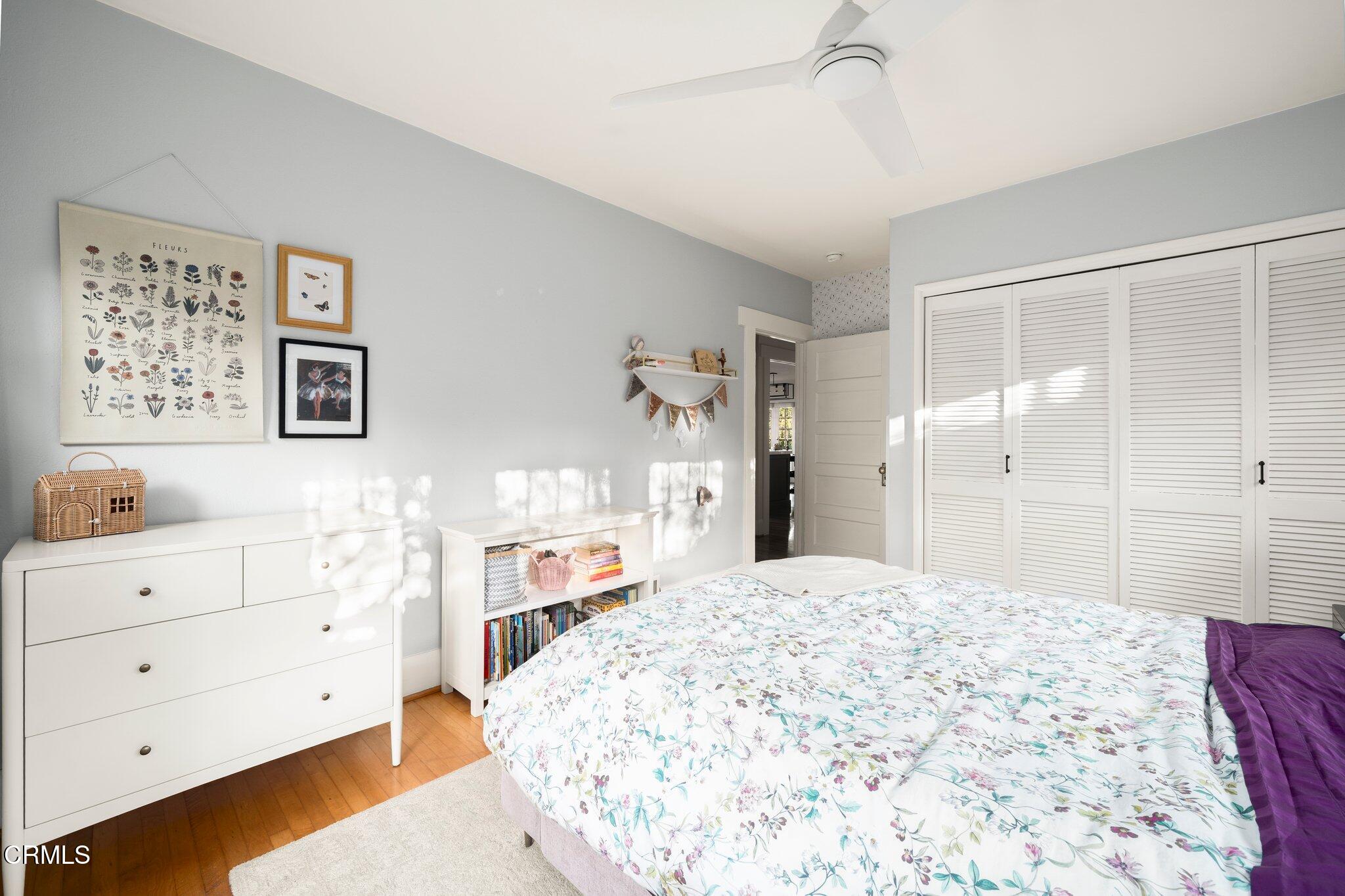 501 Douglas Street Pasadena, CA 91104 - Photo 22 of 36 a bedroom with a large bed and a dresser