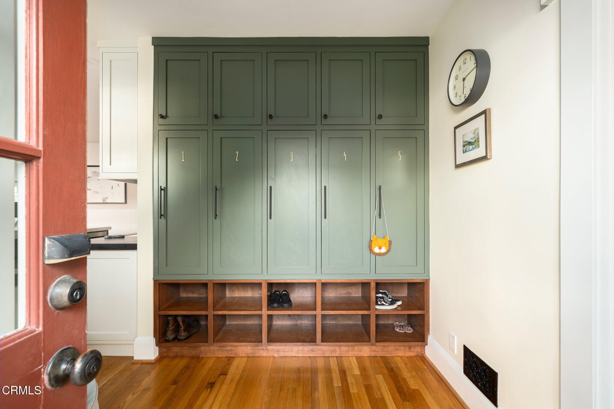 501 Douglas Street Pasadena, CA 91104 - Photo 28 of 36 a view of walk in closet with clothes and shoes