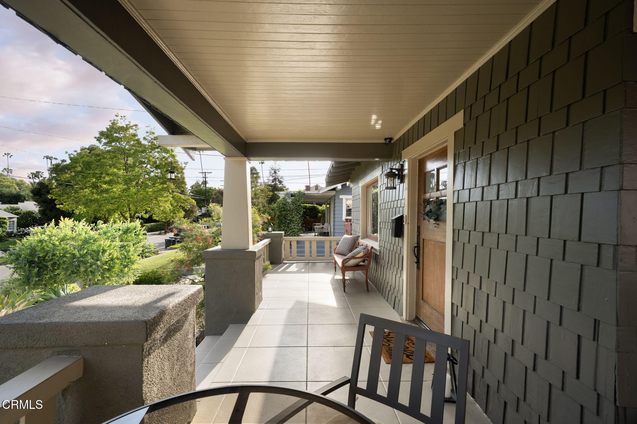 501 Douglas Street Pasadena, CA 91104 - Photo 4 of 36 a view of a porch with chairs and backyard