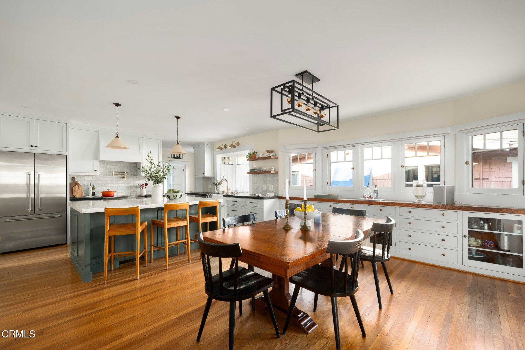 501 Douglas Street Pasadena, CA 91104 - Photo 10 of 36 a view of a dining room with furniture and wooden floor