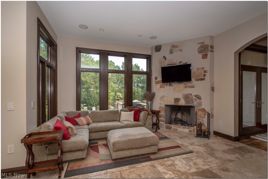 2783 Som Center Road Chagrin Falls, OH 44022 - Photo 11 of 33 A cozy hearth room is complete with a fireplace. Perfect complement to the kitchen.