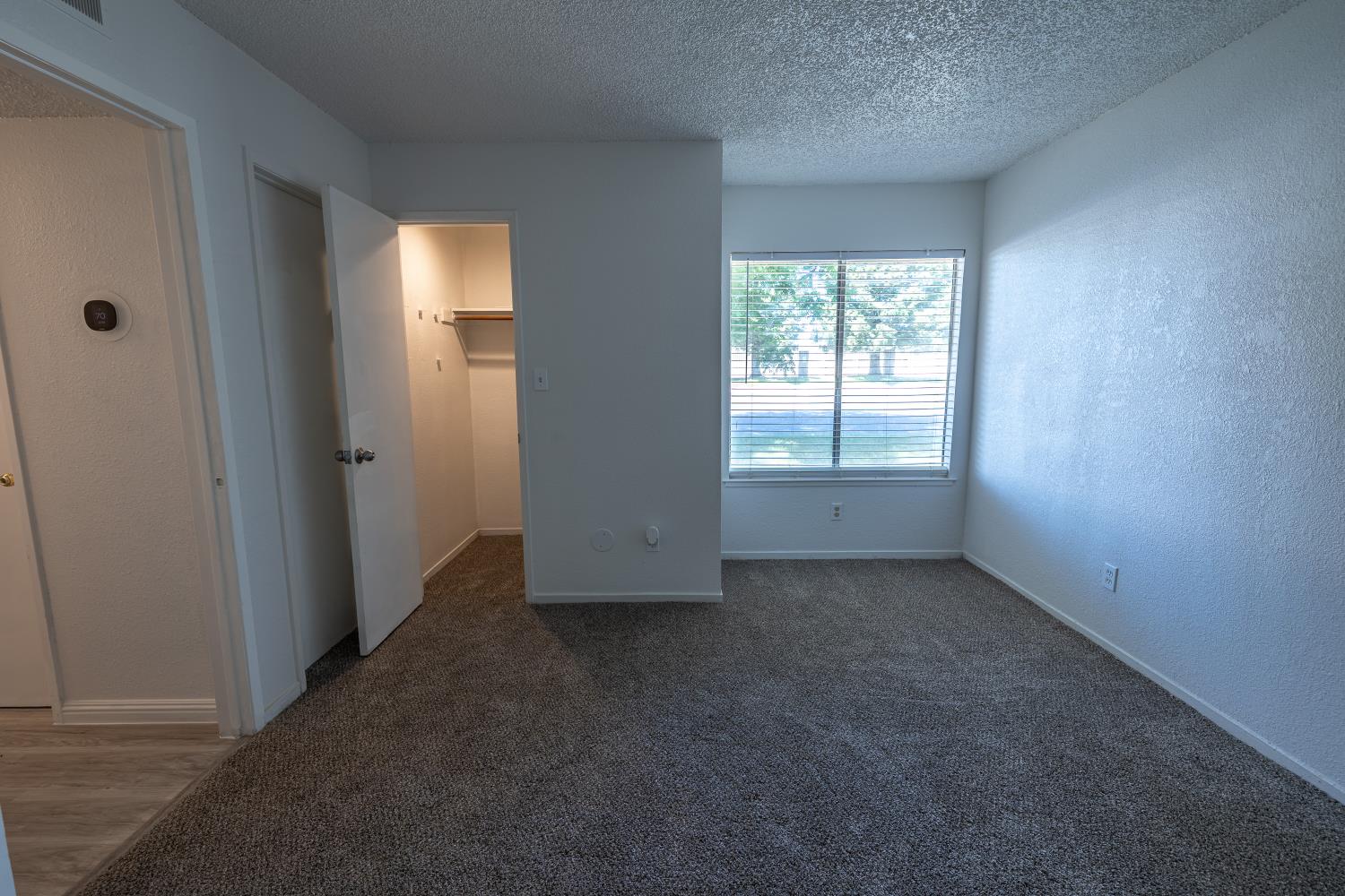 3700 Tully Road, Unit 5 Modesto, CA 95356 - Photo 20 of 38 an empty room with windows
