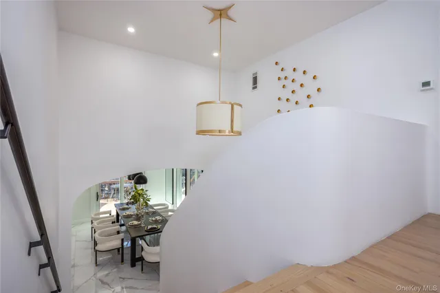 a workspace with furniture and wooden floor