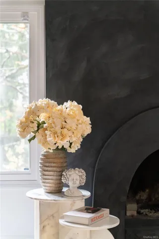 a vase of flowers sitting on a table