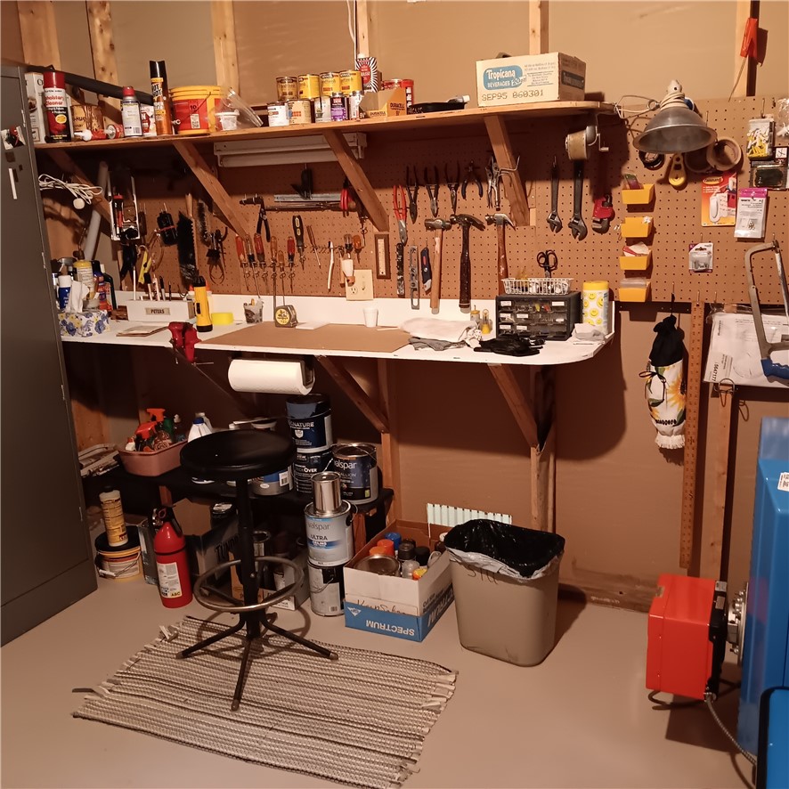 4931 Devlen Road Locke, NY 13092 - Photo 16 of 24 Utility room workbench