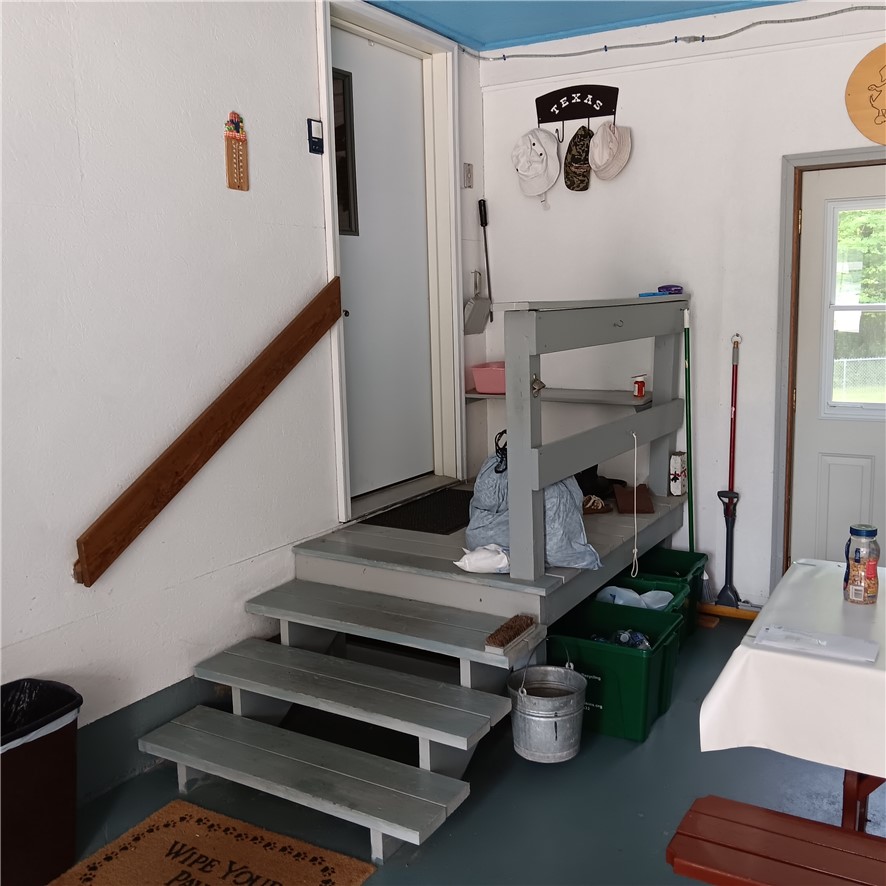 4931 Devlen Road Locke, NY 13092 - Photo 18 of 24 Stairs to attached Garage