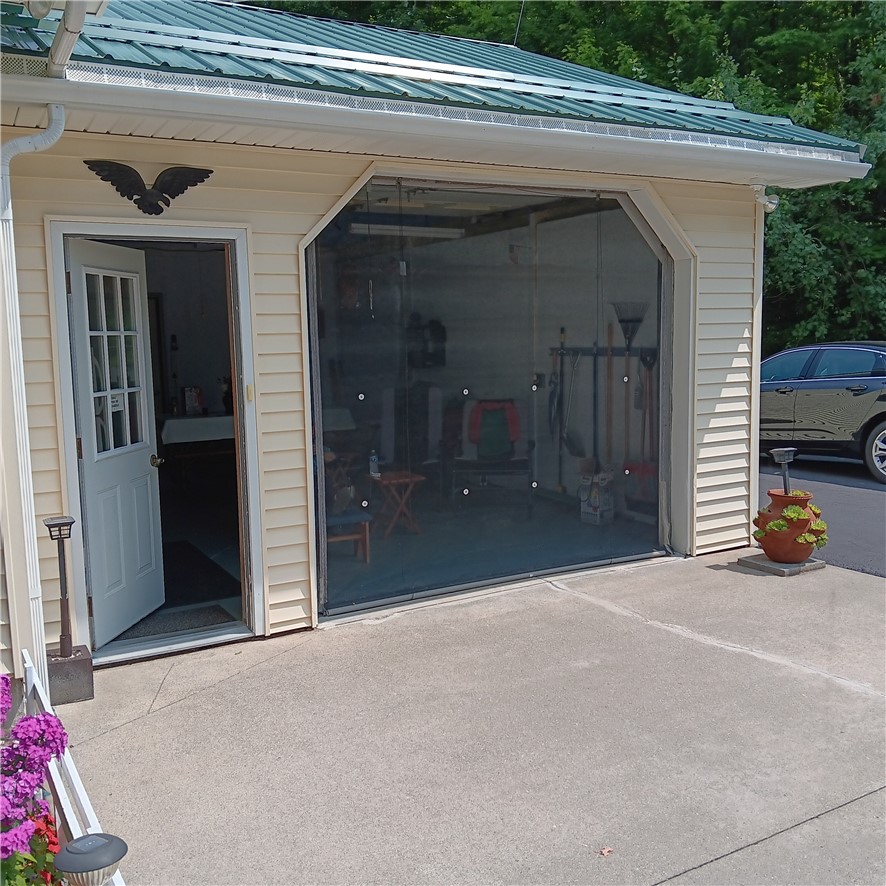 4931 Devlen Road Locke, NY 13092 - Photo 19 of 24 attached garage