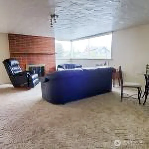 a kitchen with a stove a sink and a refrigerator