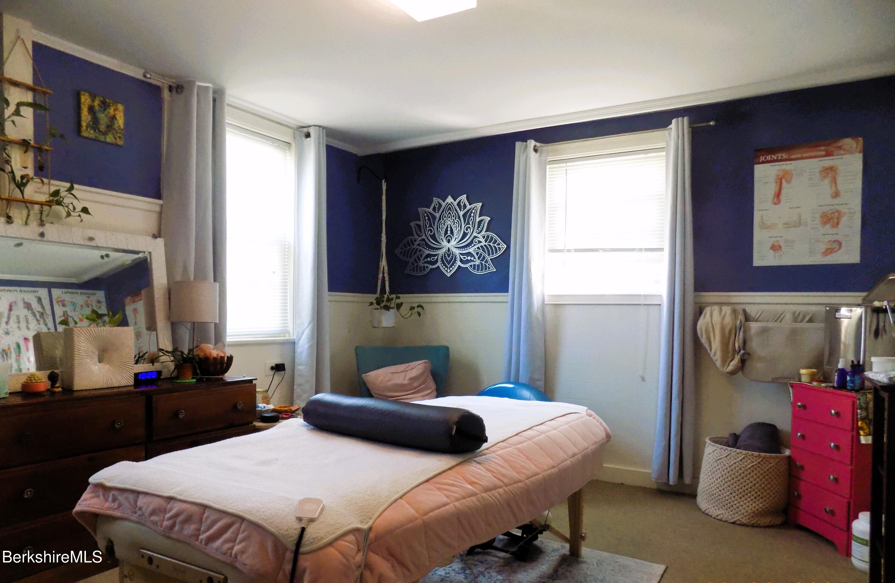 208 Main Street Lee, MA 01238 - Photo 16 of 29 a bedroom with a bed and window