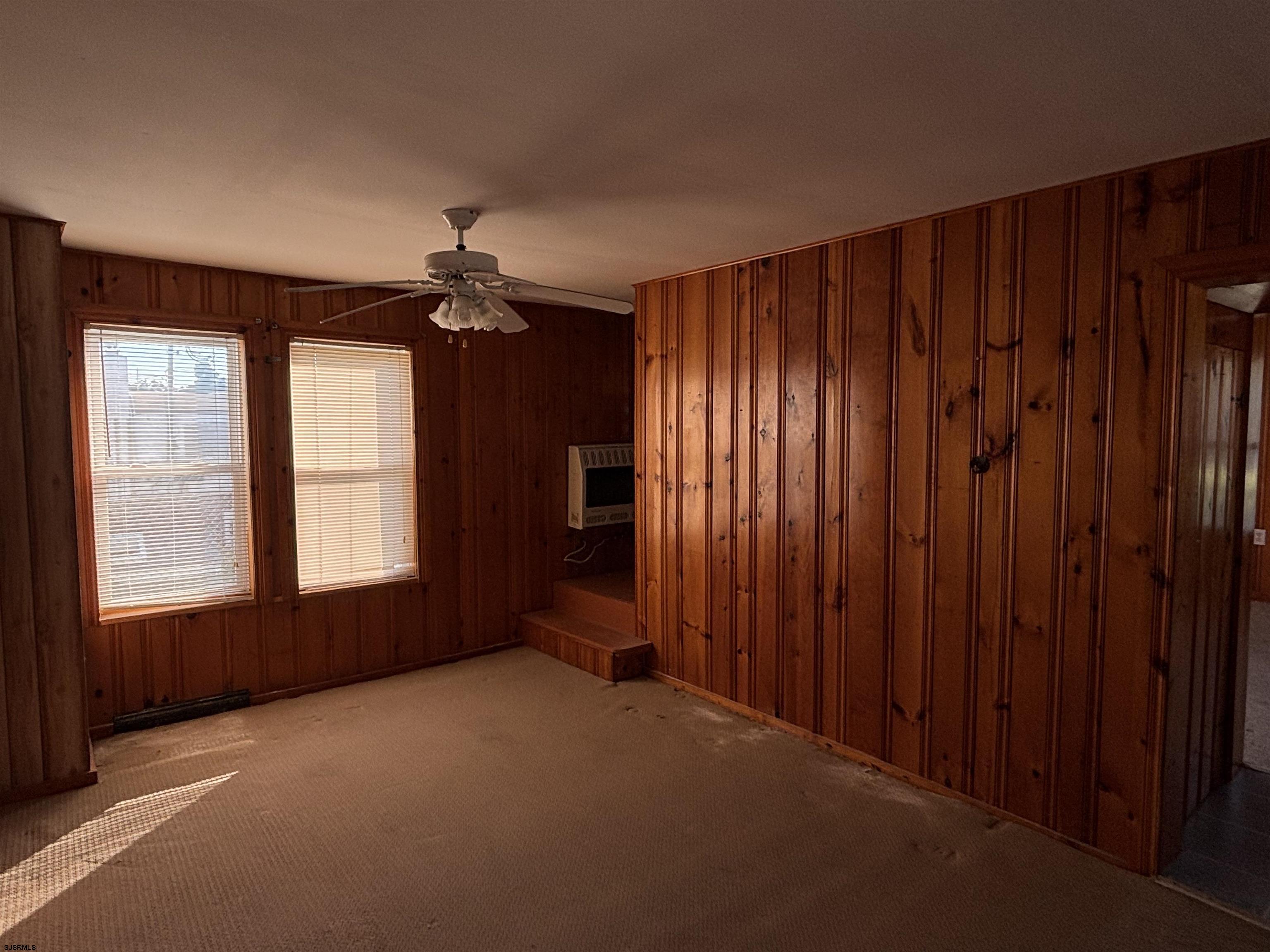1233 Highway 9 Ocean View, NJ 08230 - Photo 16 of 33 a view of a livingroom with a ceiling fan and window