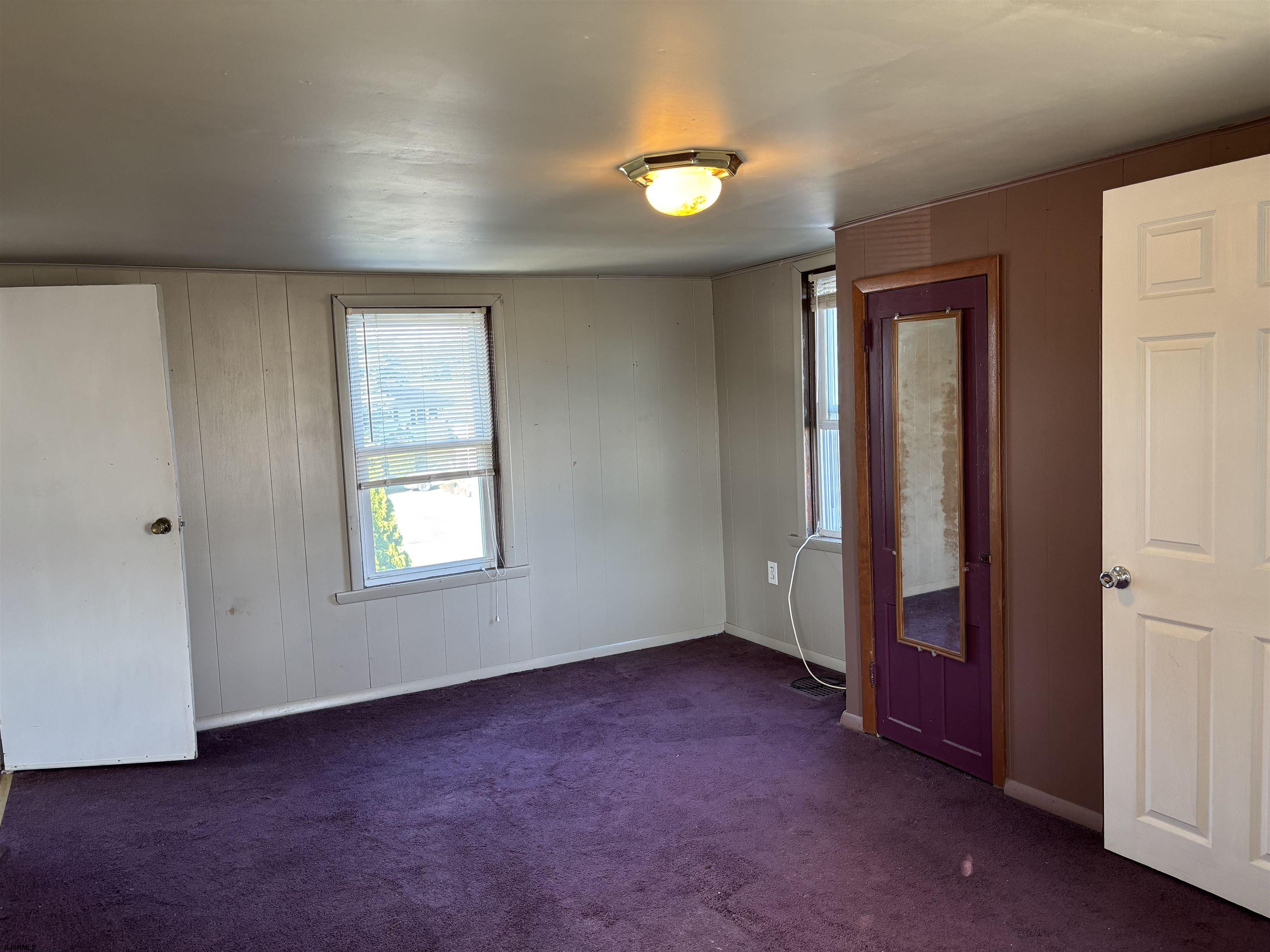 1233 Highway 9 Ocean View, NJ 08230 - Photo 22 of 33 an empty room with windows and closet