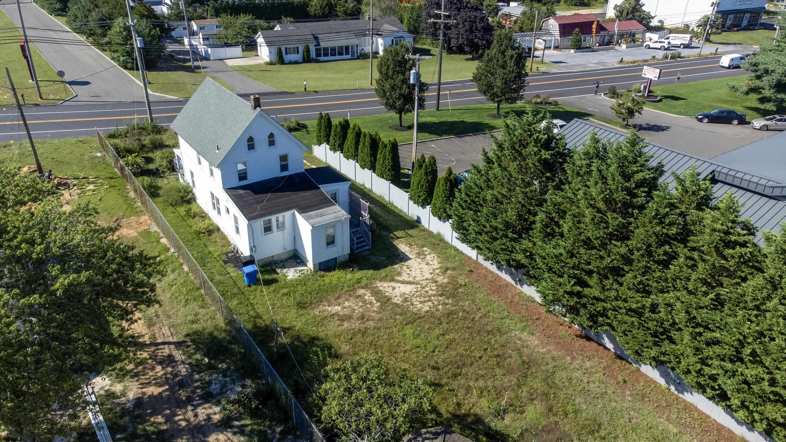 1233 Highway 9 Ocean View, NJ 08230 - Photo 28 of 33 an aerial view of a house with swimming pool outdoor seating and yard