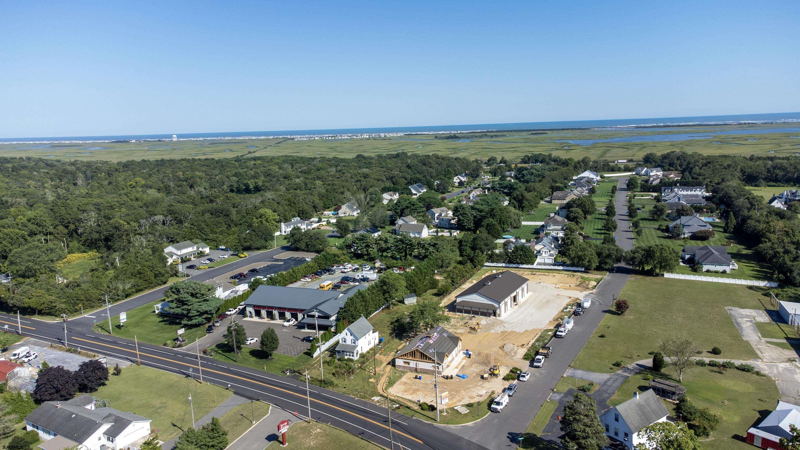 1233 Highway 9 Ocean View, NJ 08230 - Photo 9 of 33 an aerial view of residential houses with outdoor space