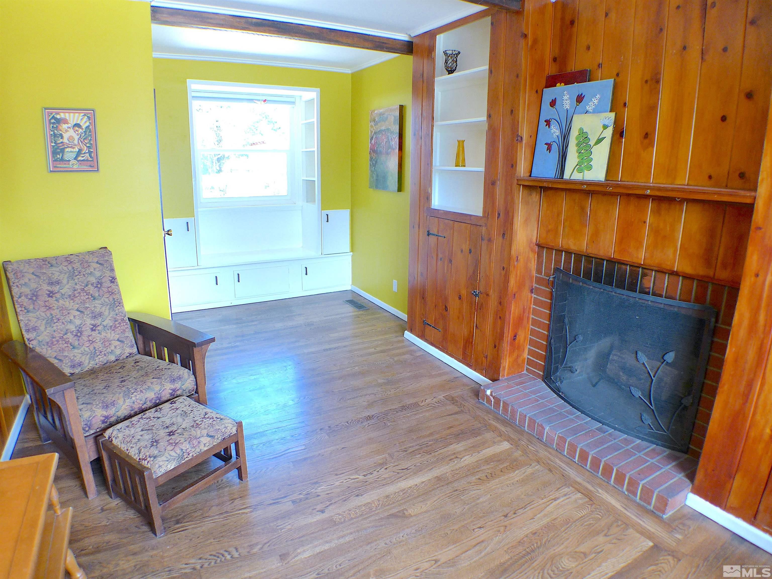 925 Yori Avenue Reno, NV 89502 - Photo 5 of 20 a living room with furniture and a wooden floor