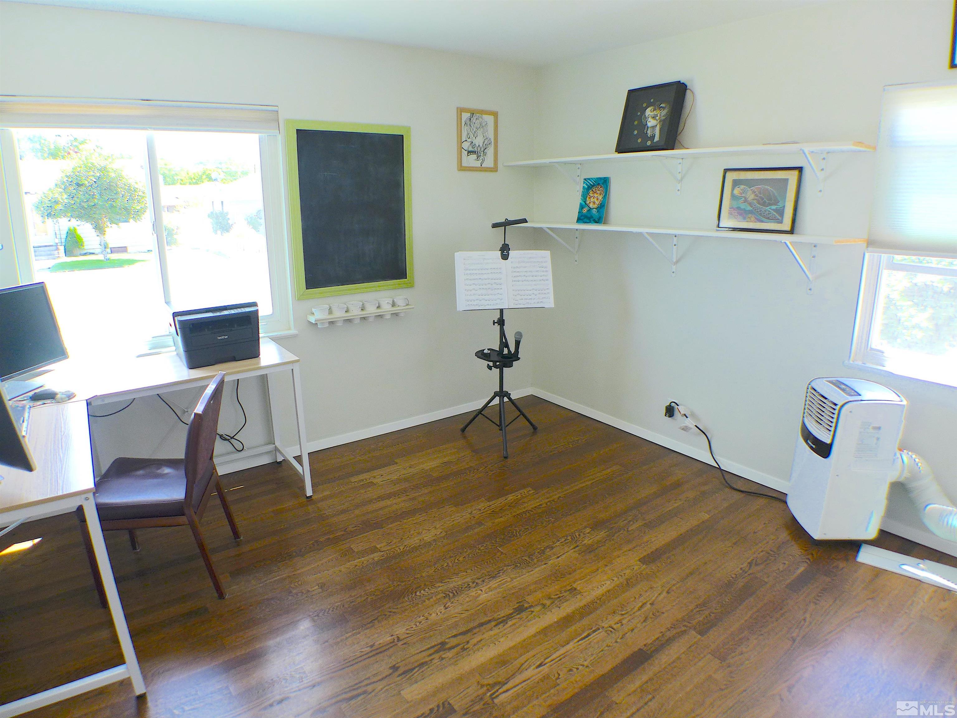 925 Yori Avenue Reno, NV 89502 - Photo 10 of 20 a workspace with wooden floor