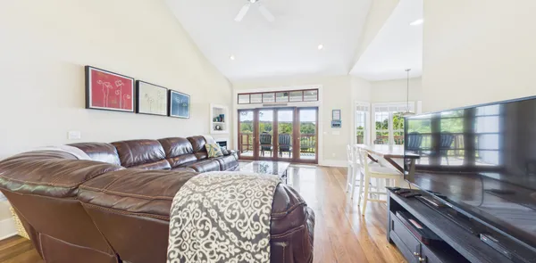 a front view of house with yard and green space