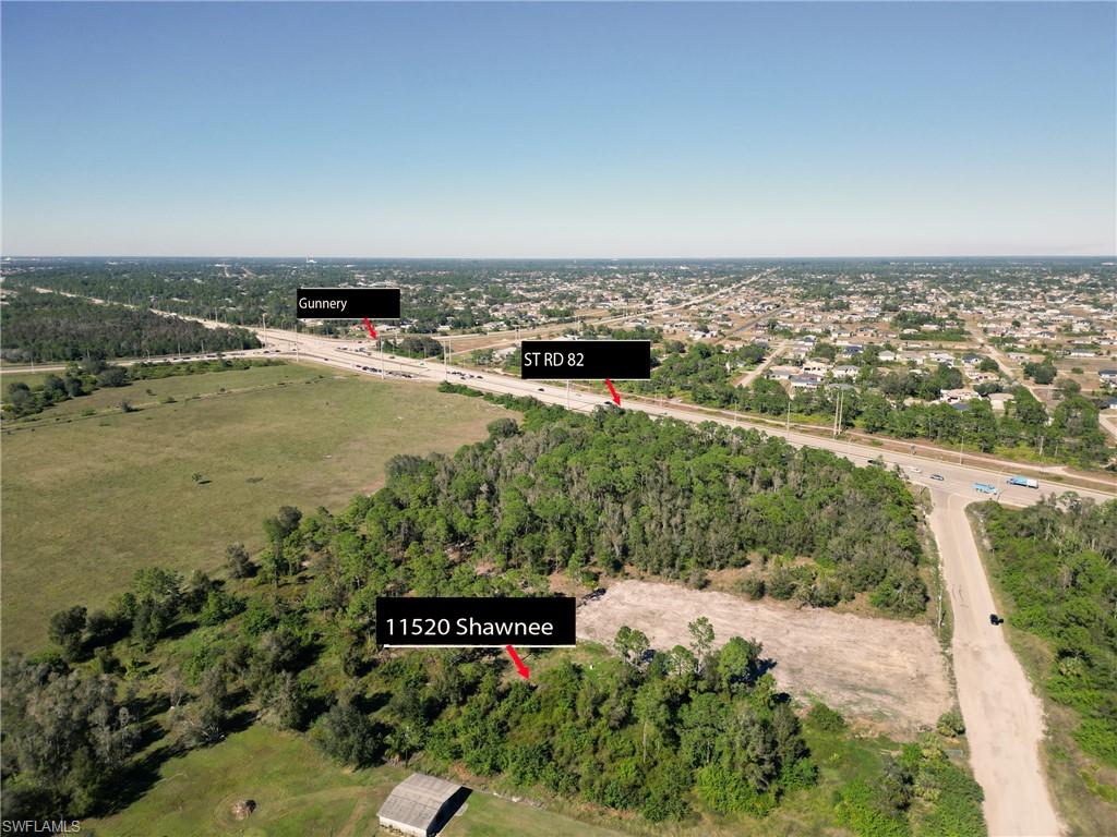 11520 Shawnee Road Fort Myers, FL 33913 - Photo 3 of 13 an aerial view of ocean with residential house with outdoor space