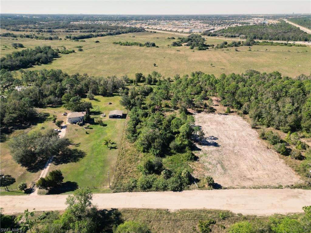 11520 Shawnee Road Fort Myers, FL 33913 - Photo 7 of 13 an aerial view of ocean with residential house with outdoor space