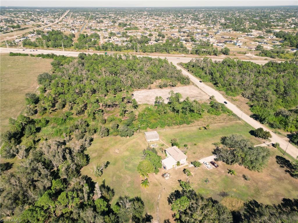 11520 Shawnee Road Fort Myers, FL 33913 - Photo 8 of 13 an aerial view of residential houses with outdoor space