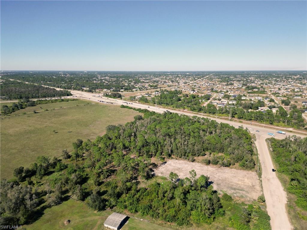 11520 Shawnee Road Fort Myers, FL 33913 - Photo 9 of 13 an aerial view of ocean with residential houses with outdoor space